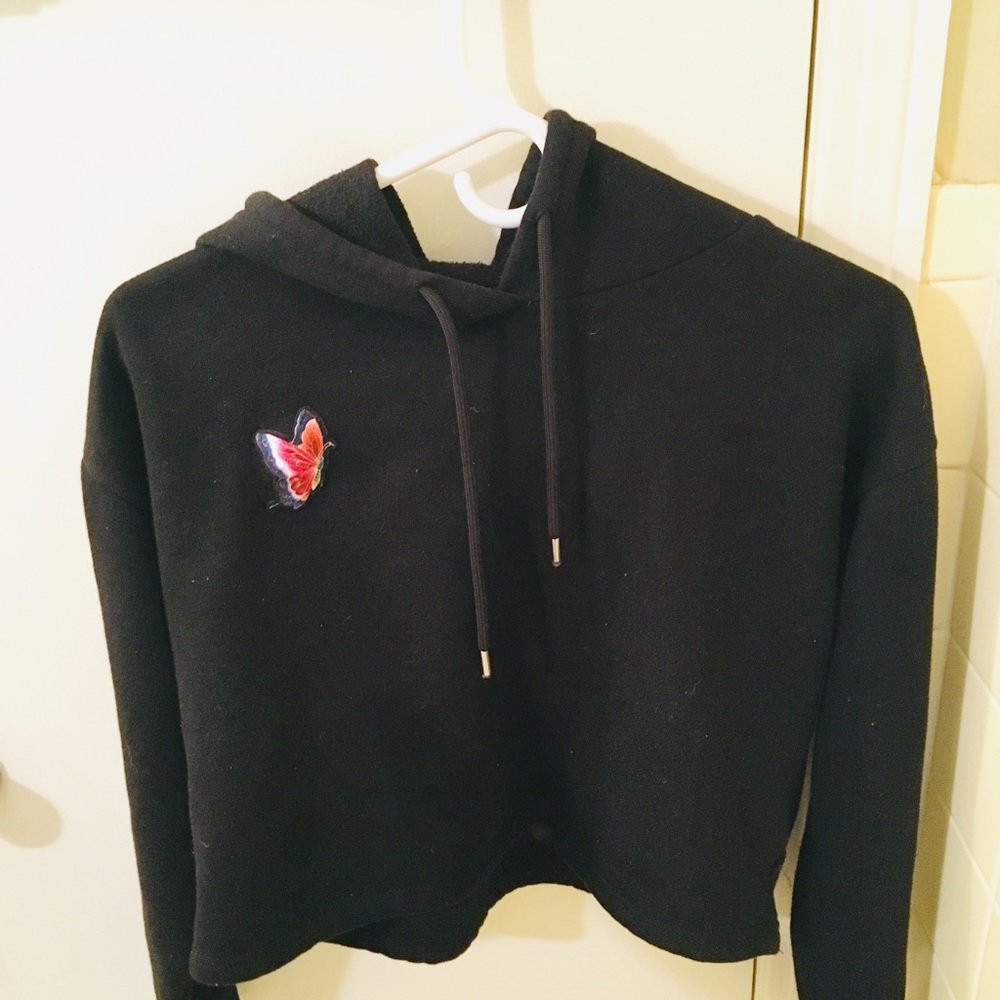 A black cropped jacket